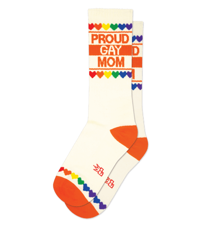 Sock with "PROUD GAY MOM" text and rainbow hearts, natural cotton with red accents.