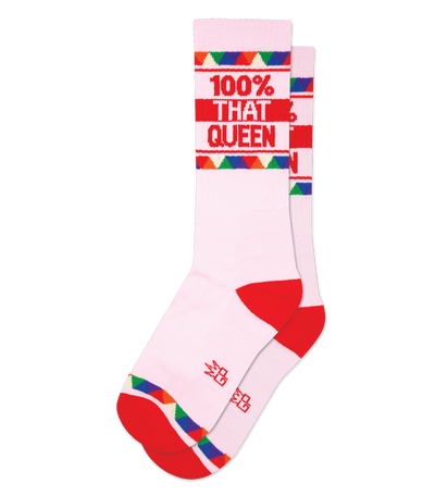 Pink sock with "100% THAT QUEEN" text, red accents, and colorful geometric patterns.