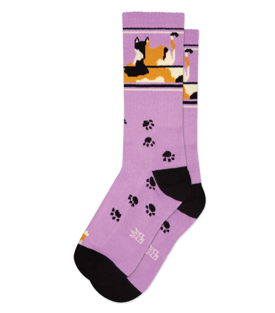 Lavender purple sock with black accents, cat silhouette, paw prints, and Asian characters.