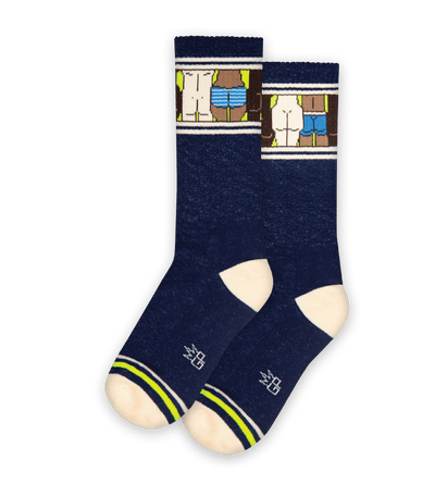 Navy blue socks with coffee brown accents and decorative pattern, no background.
