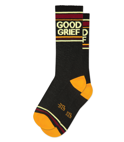 Black socks with light yellow accents, featuring text "GOOD GRIEF" and "DF" above stripes on the cuff.