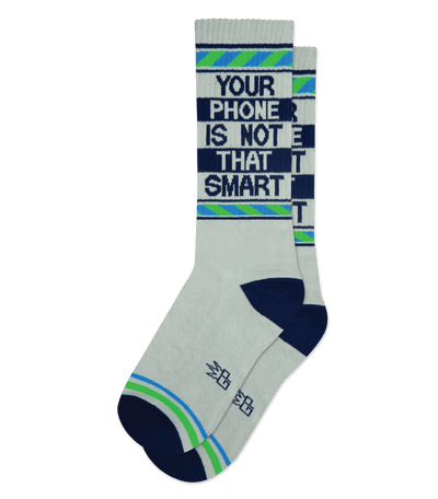 Gray sock with text "YOUR PHONE IS NOT THAT SMART" in blue, and light blue accents, no background.