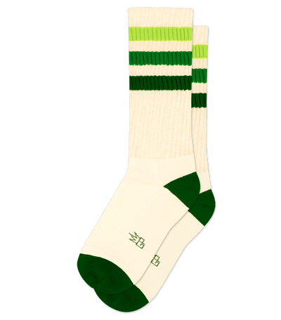 Natural cotton socks with dark green accents and stripes, no discernible text.