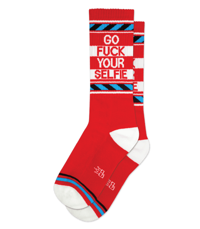 Red sock with text "GO [expletive] YOUR SELFIE" and black accents, no background.