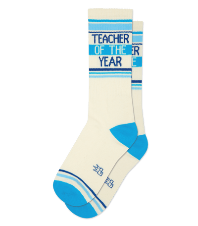 Natural cotton sock with royal blue accents, texts "Teacher of the Year" visible. Blue heel and toe.