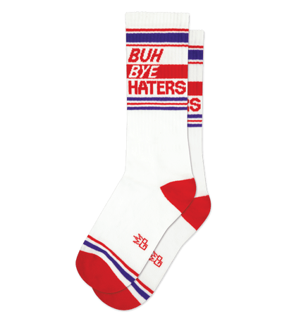 White socks with red and blue stripes, text "BUH BYE HATERS" on the leg, red toe, and emblem on foot.